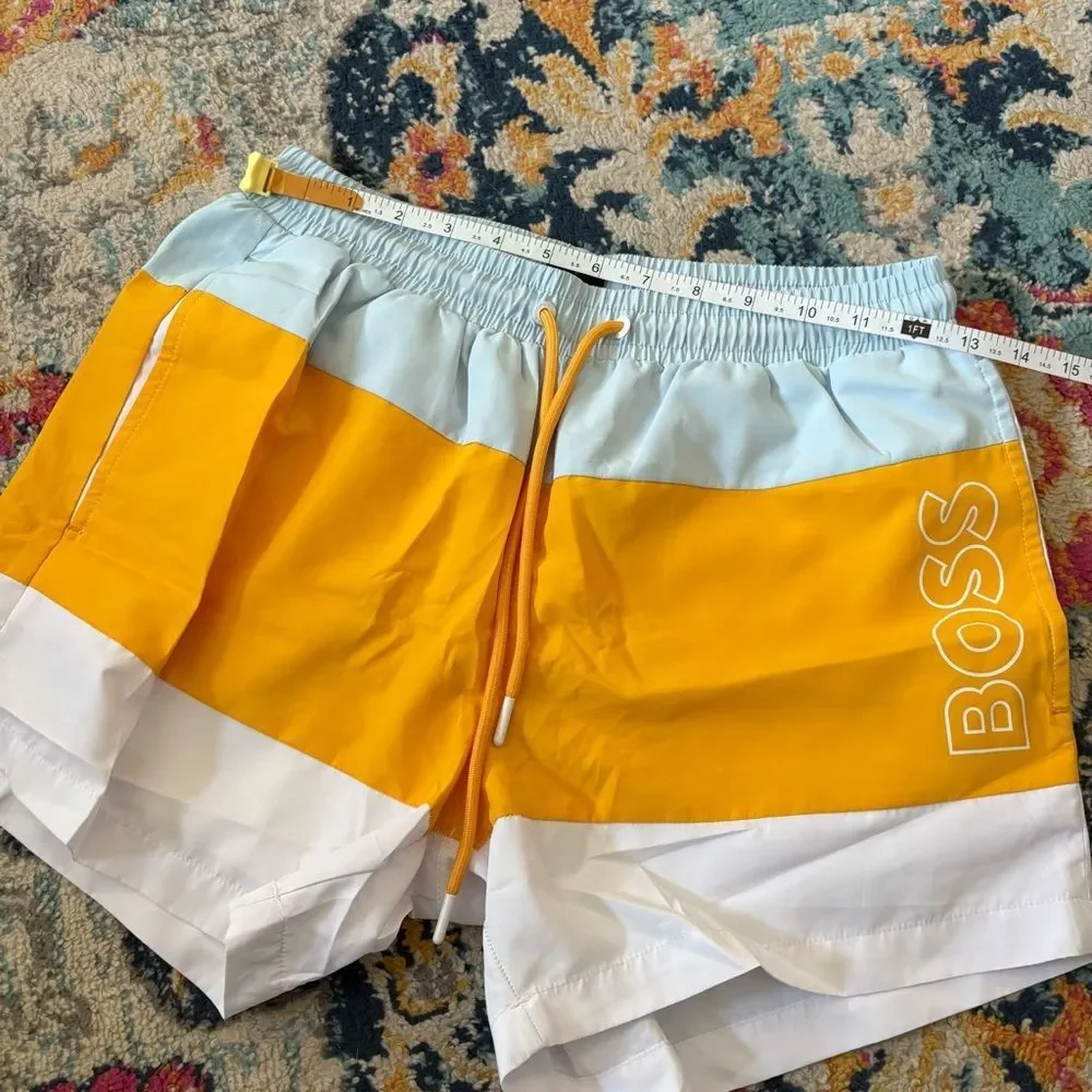 NEW HUGO BOSS men's coco swim shorts in open yellow Small